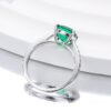 18K White Gold Emerald Ring with Four-Prong Setting and Diamond Accents